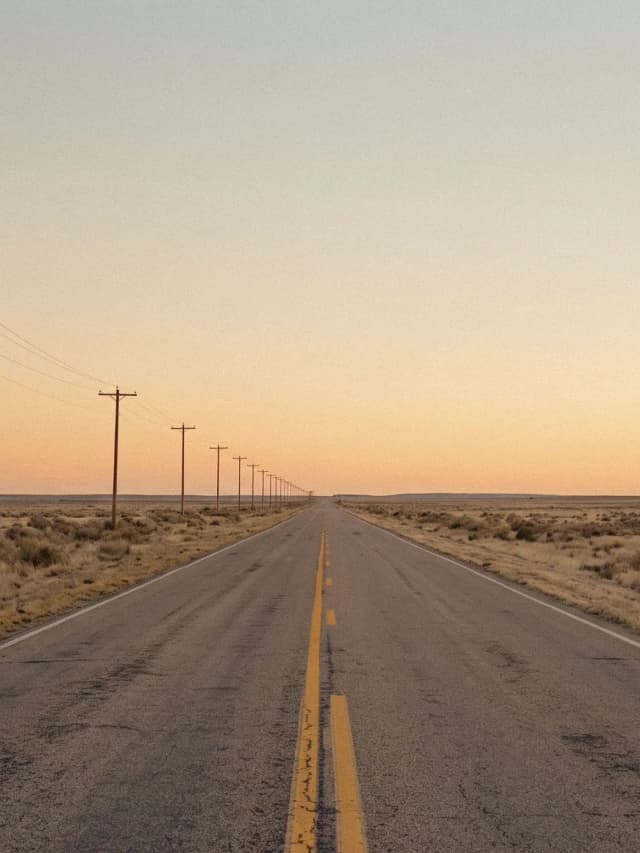 Route 2 at dusk, the road running straight to the horizon