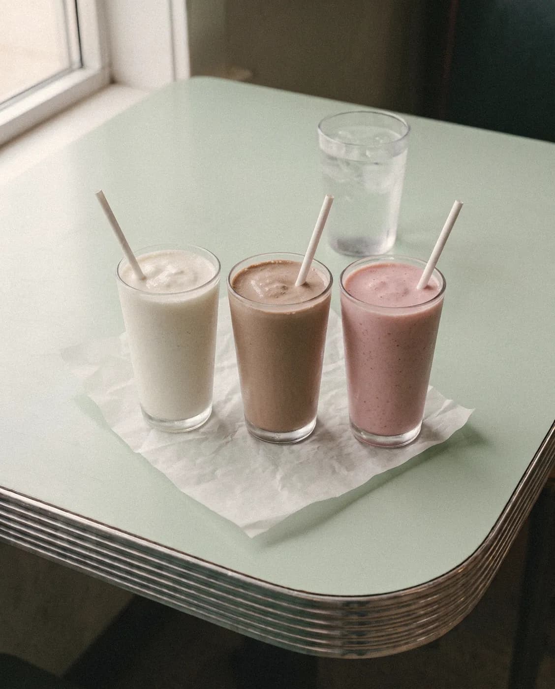 Vanilla, chocolate and strawberry milkshakes
